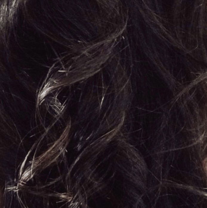 Close-up of dark body-wave hair
